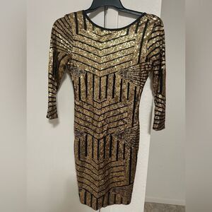 Yidarton black and gold sequins. Size M New with tag